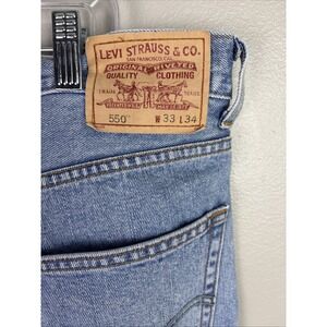 Vintage Levi's 550 Men's Relaxed Fit Light Wash Denim Jeans Size 33x34